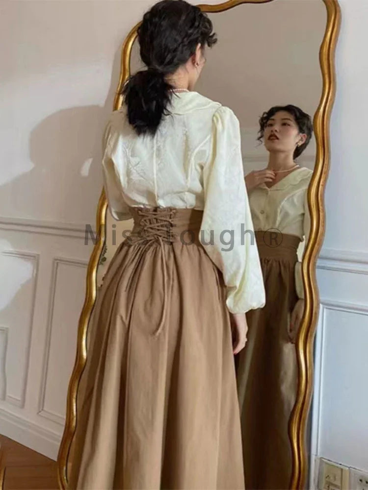 Winter Dark Brown Vintage Skirt Women Harajuku Pocket Elegant Long Skirts Female Korean Fashion Designer Y2k Casual Skirts 2026
